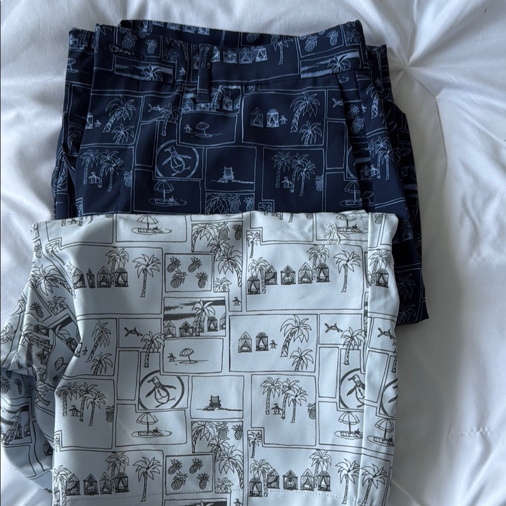 Two pair of fun patterned Original Penguin Shorts size 32